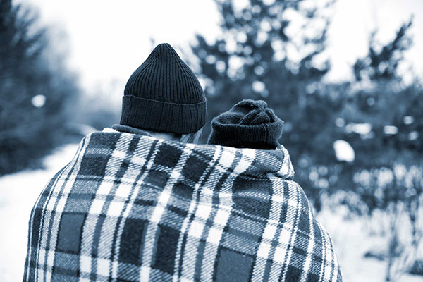 Couple in snowy forest